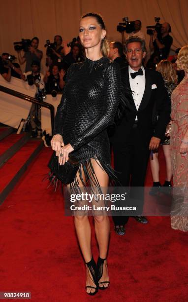 Model Gisele Bundchen attends the Costume Institute Gala Benefit to celebrate the opening of the "American Woman: Fashioning a National Identity"...