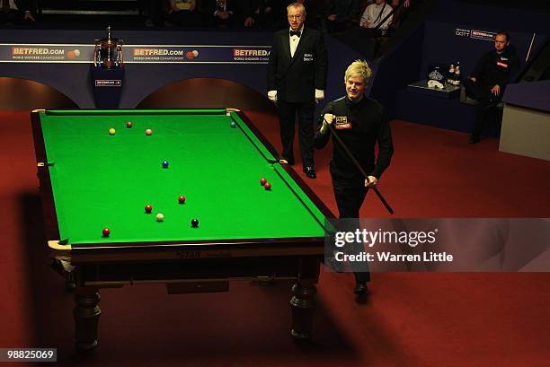 Neil Robertson of Australia celebrates beating Graeme Dott of Scotland during the final of the Betfred.com World Snooker Championships at The...