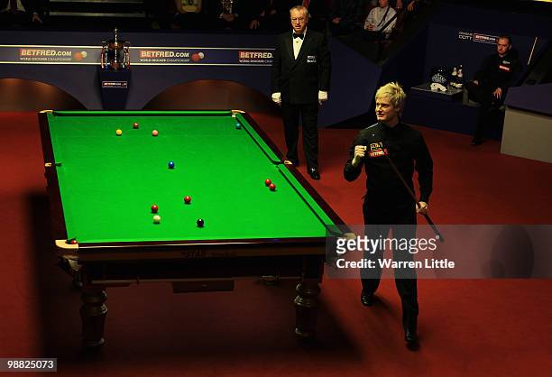 Neil Robertson of Australia celebrates beating Graeme Dott of Scotland during the final of the Betfred.com World Snooker Championships at The...