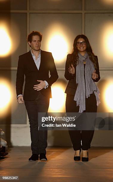 Designers Camilla Freeman-Topper and Marc Freeman acknowledge the audience follwoing their catwalk show on the second day of Rosemount Australian...