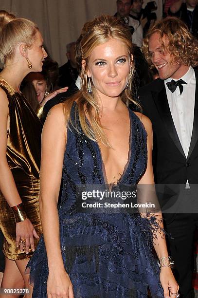 Actress Sienna Miller attends the Costume Institute Gala Benefit to celebrate the opening of the "American Woman: Fashioning a National Identity"...