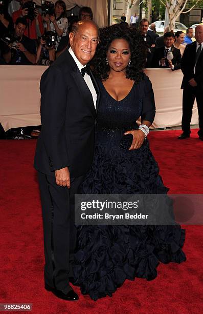 Designer Oscar De La Renta and Oprah Winfrey attend the Metropolitan Museum of Art's 2010 Costume Institute Ball at The Metropolitan Museum of Art on...