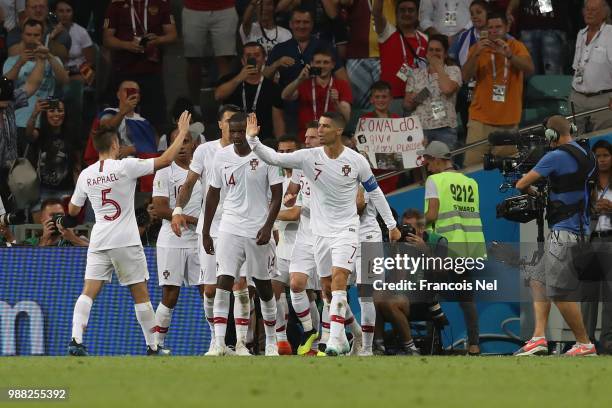 Pepe of Portugal celebrates with teammates after scoring his team's first goal during the 2018 FIFA World Cup Russia Round of 16 match between...