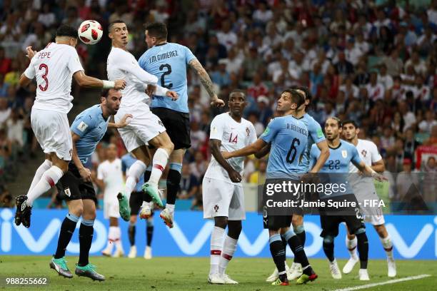 Pepe of Portugal scores his team's first goal during the 2018 FIFA World Cup Russia Round of 16 match between Uruguay and Portugal at Fisht Stadium...