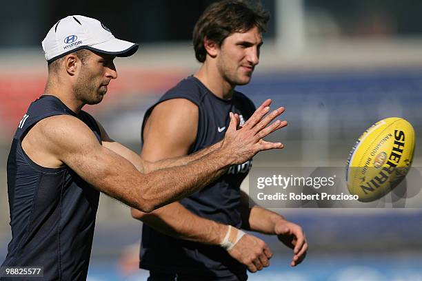 Chris Judd receives the ball during a Carlton Blues AFL training session at Visy Park on May 4, 2010 in Melbourne, Australia.