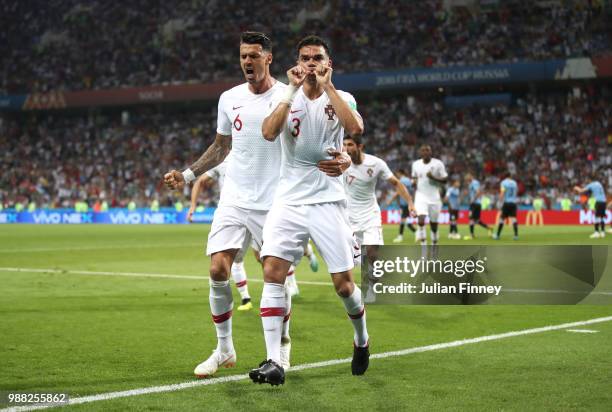 Pepe of Portugal celebrates after scoring his team's first goal with team mate Jose Fonte during the 2018 FIFA World Cup Russia Round of 16 match...