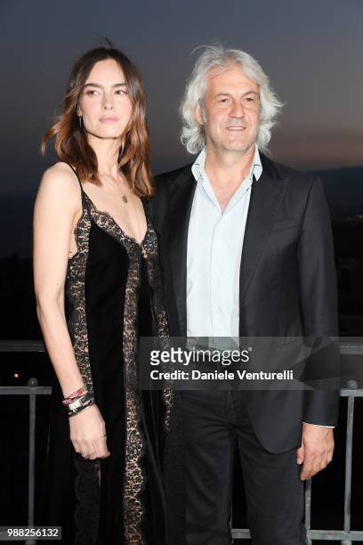 Kasia Smutniak and Domenico Procacci attend the Nastri D'Argento cocktail party on June 30, 2018 in Taormina, Italy.
