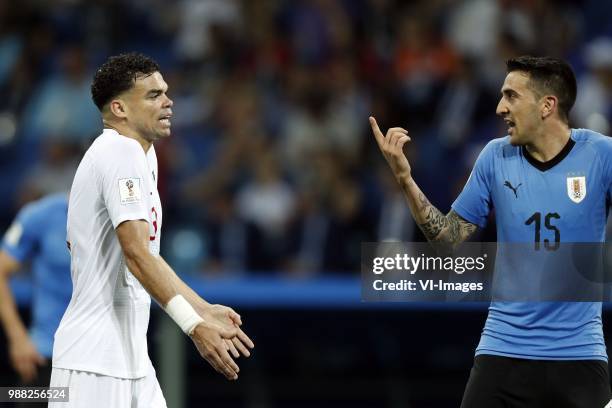 Pepe of Portugal, Matias Vecino of Uruguay during the 2018 FIFA World Cup Russia round of 16 match between Uruguay and at the Fisht Stadium on June...