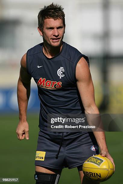 Richard Hadley handballs during a Carlton Blues AFL training session at Visy Park on May 4, 2010 in Melbourne, Australia.