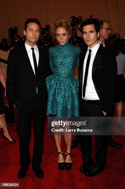 Designers Jack McCollough and Lazaro Hernandez of Proenza Schouler pose with actress Chloe Sevigny at the Costume Institute Gala Benefit to celebrate...