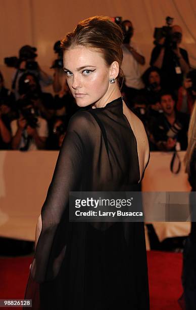 Model Caroline Trentini attends the Costume Institute Gala Benefit to celebrate the opening of the "American Woman: Fashioning a National Identity"...