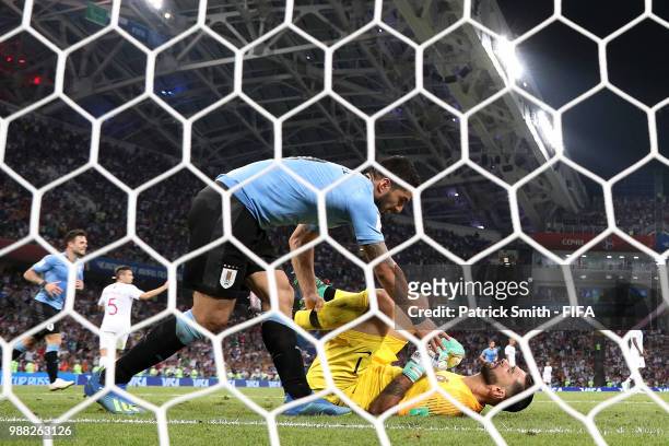 Luis Suarez of Uruguay consoles Rui Patricio of Portugal following Uruguay's second goal during the 2018 FIFA World Cup Russia Round of 16 match...
