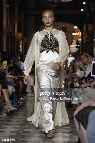 Adwoa Aboah walks the runway during Miu Miu 2019 Cruise Collection Show at Hotel Regina on June 30, 2018 in Paris, France.