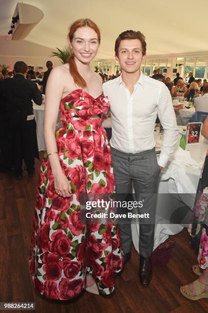 Eleanor Tomlinson and Tom Holland attend the Audi Polo Challenge at Coworth Park Polo Club on June 30, 2018 in Ascot, England.