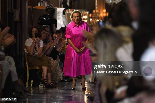 Miuccia Prada greets the crowd on the runway during Miu Miu 2019 Cruise Collection Show at Hotel Regina on June 30, 2018 in Paris, France.