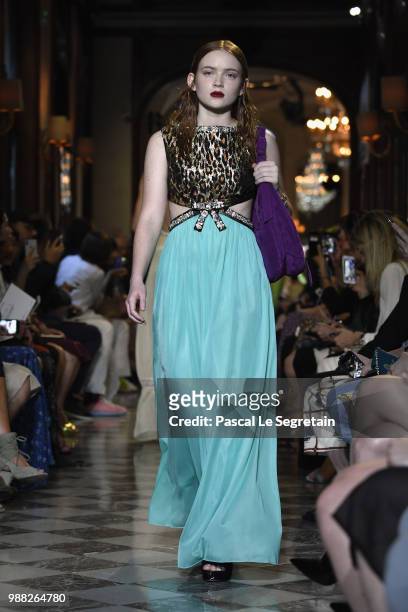 Model walks the runway during Miu Miu 2019 Cruise Collection Show at Hotel Regina on June 30, 2018 in Paris, France.