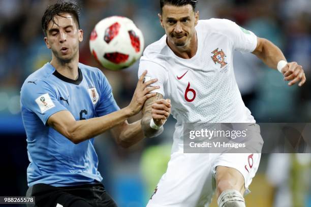 Rodrigo Bentancur of Uruguay, Jose Fonte of Portugal during the 2018 FIFA World Cup Russia round of 16 match between Uruguay and at the Fisht Stadium...