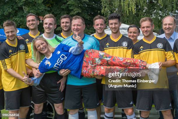 Actres Monika Gruber and the Munich Police Soccer team during the Erich Greipl Tribute Tournament under the patronage of Barbara Stamm, President of...