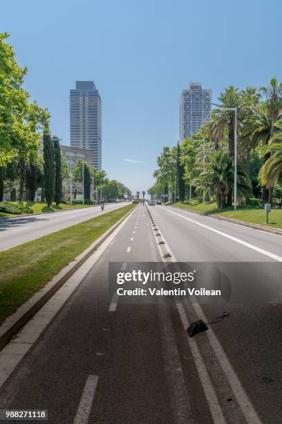 biking to barceloneta beach - barceloneta beach stock pictures, royalty-free photos & images