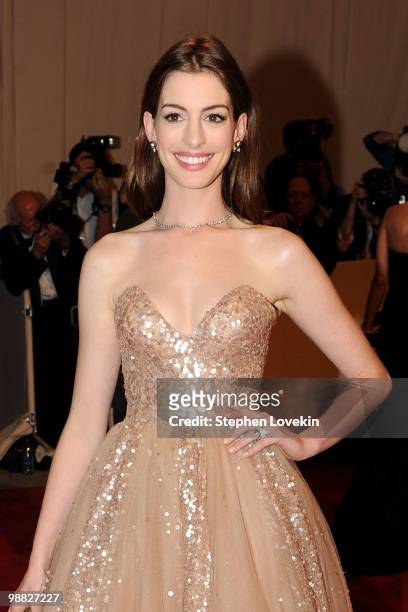 Actress Anne Hathaway attends the Costume Institute Gala Benefit to celebrate the opening of the "American Woman: Fashioning a National Identity"...