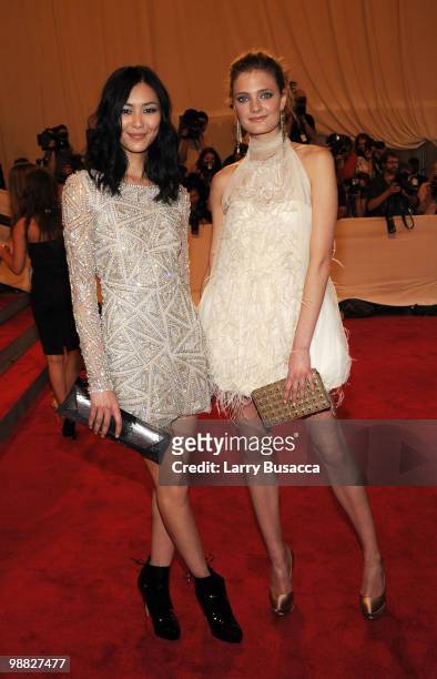 Models Liu Wen and Constance Jablonski attend the Costume Institute Gala Benefit to celebrate the opening of the "American Woman: Fashioning a...