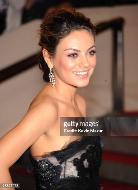 Mila Kunis attends the Costume Institute Gala Benefit to celebrate the opening of the "American Woman: Fashioning a National Identity" exhibition at...