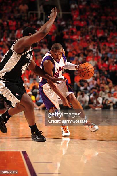 Leandro Barbosa of the Phoenix Suns drives against DeJuan Blair of the San Antonio Spurs in Game One of the Western Conference Semifinals during the...