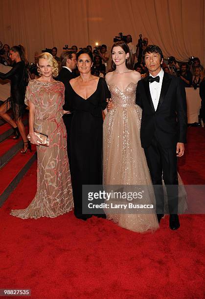Actress Kate Bosworth, designer Maria Grazia Chiuri, actress Anne Hathaway and designer Pier Paolo Piccioli attend the Costume Institute Gala Benefit...