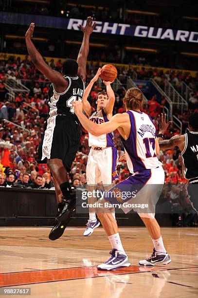 Goran Dragic of the Phoenix Suns shoots over the block of DeJuan Blair of the San Antonio Spurs in Game One of the Western Conference Semifinals...