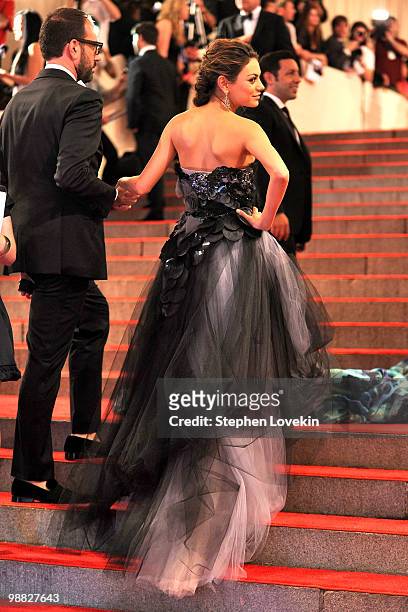 Actress Mila Kunis attends the Costume Institute Gala Benefit to celebrate the opening of the "American Woman: Fashioning a National Identity"...