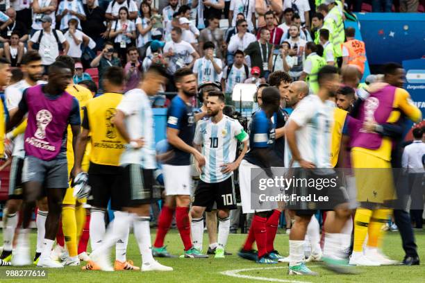 Lionel Messi of Argentina waits with team-mates before the 2018 FIFA World Cup Russia Round of 16 match between France and Argentina at Kazan Arena...