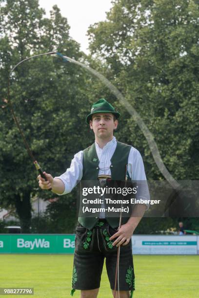 Traditional Bavarian "Goaßlschnoizer" during the Erich Greipl Tribute Tournament under the patronage of Barbara Stamm, President of the Bavarian...