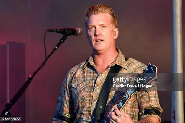 Josh Homme of Queens of the Stone Age performs on stage at Finsbury Park on June 30, 2018 in London, England.