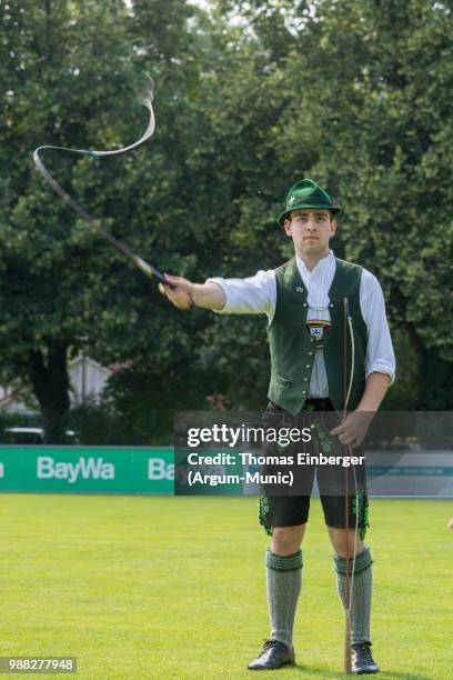 Traditional Bavarian "Goaßlschnoizer" during the Erich Greipl Tribute Tournament under the patronage of Barbara Stamm, President of the Bavarian...