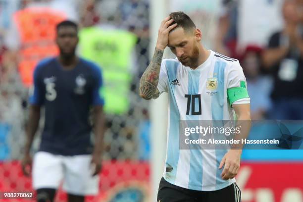 Lionel Messi of Argentina looks dejected during the 2018 FIFA World Cup Russia Round of 16 match between France and Argentina at Kazan Arena on June...