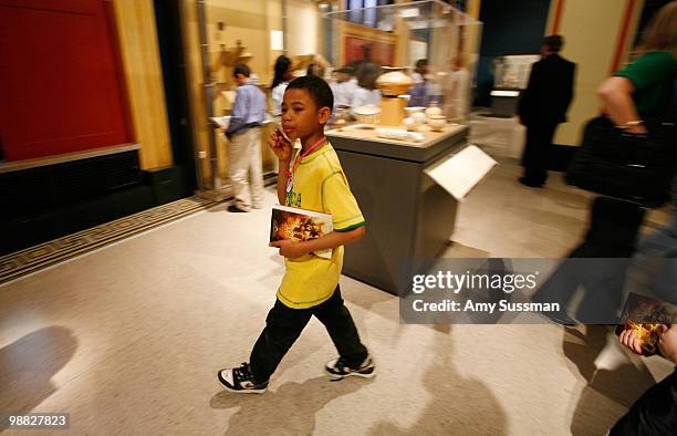 Child looks at the Egyptian exhibit at the launch party of Rick Riordan's The Kane Chronicles, Book 1: The Red Pyramid at Brooklyn Museum on May 3,...