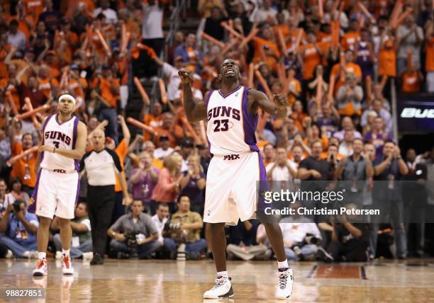 Jason Richardson of the Phoenix Suns celebrates after hitting a three point shot against the San Antonio Spurs during Game One of the Western...