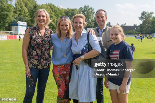 From left: Saskia Greipl Kostantinidis, actres Monika Gruber, Simone Tucci-Diekmann , Marco Tucci, daughter Tucci during the Erich Greipl Tribute...