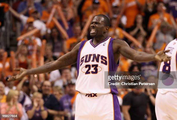 Jason Richardson of the Phoenix Suns celebrates after hitting a three point shot against the San Antonio Spurs during Game One of the Western...