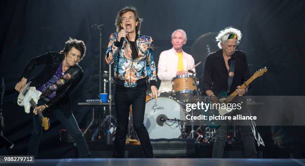 June 2018, Germany, Stuttgart: Guitarist Ron Wood , singer Mick Jagger, drummer Charlie Watts and guitarist Keith Richards on stage at a concert by...