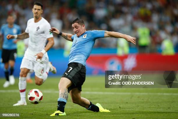 Uruguay's midfielder Cristian Rodriguez tries to control the ball during the Russia 2018 World Cup round of 16 football match between Uruguay and...