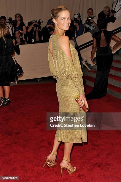 Model Carolyn Murphy attends the Costume Institute Gala Benefit to celebrate the opening of the "American Woman: Fashioning a National Identity"...