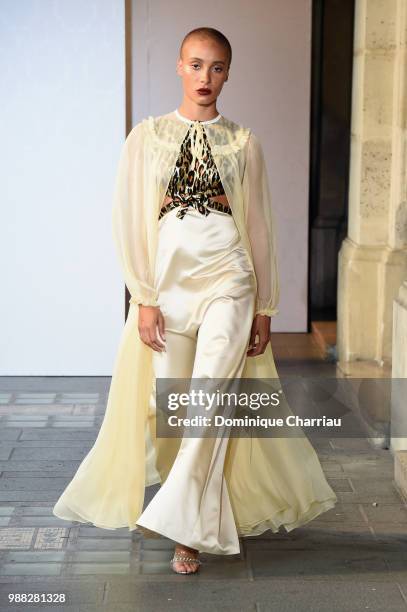 Adwoa Aboah walks the runway during Miu Miu 2019 Cruise Collection Show at Hotel Regina on June 30, 2018 in Paris, France.