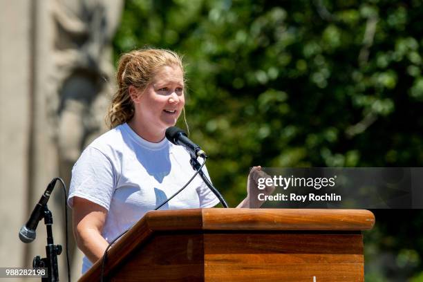 Amy Schumer on stage during the Families Belong Together Rally and March in New York City on June 30, 2018 in New York City.