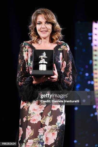 Claudia Gerini is awarded during the Nastri D'Argento Award Ceremony on June 30, 2018 in Taormina, Italy.