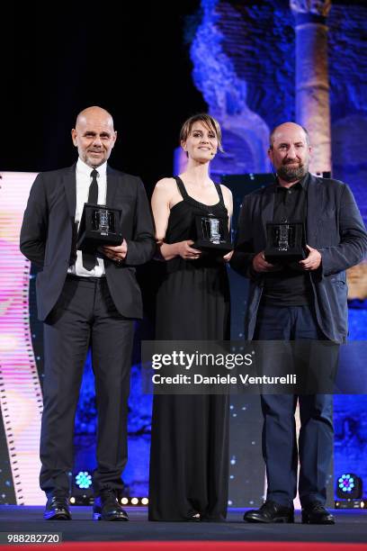 Riccardo Milani, Paola Cortellesi and Antonio Albanese are awarded during the Nastri D'Argento Award Ceremony on June 30, 2018 in Taormina, Italy.