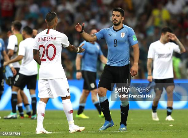 Ricardo Quaresma of Portugal and Luis Suarez of Uruguay shake hands following the 2018 FIFA World Cup Russia Round of 16 match between Uruguay and...