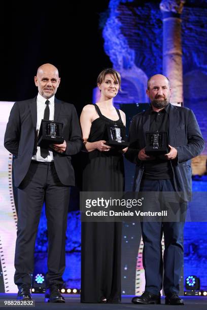 Riccardo Milani, Paola Cortellesi and Antonio Albanese are awarded during the Nastri D'Argento Award Ceremony on June 30, 2018 in Taormina, Italy.