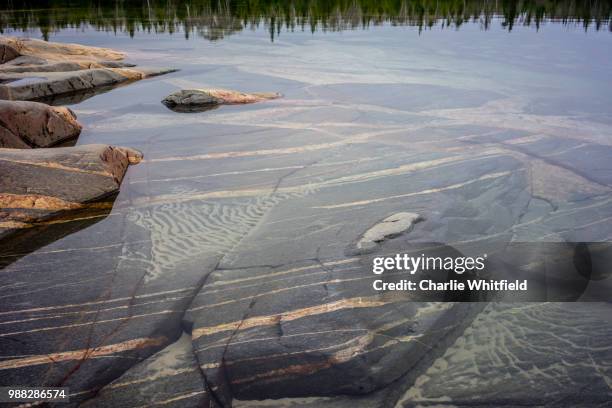 gneiss with intrusions - gneiss stock pictures, royalty-free photos & images