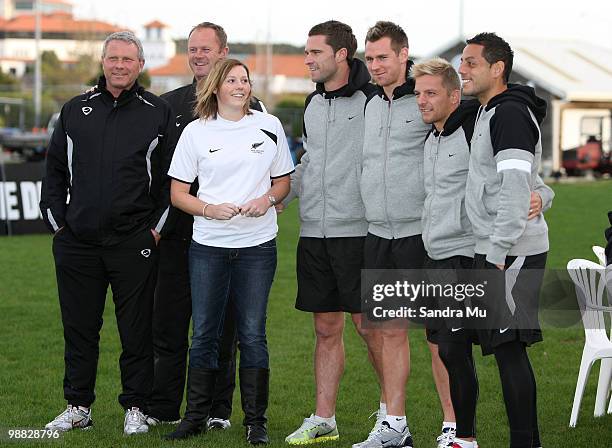 All White Coach Ricki Herbert and players have their photo taken with a fan during an All White autograph session at North Harbour Stadium on May 4,...